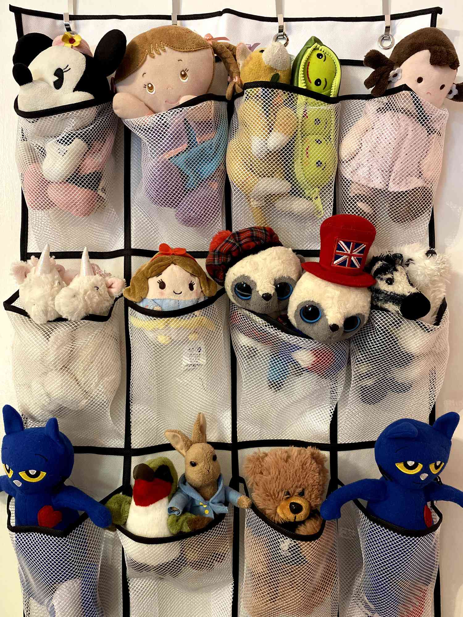 Over the door shoe holder stores stuffed animal toys