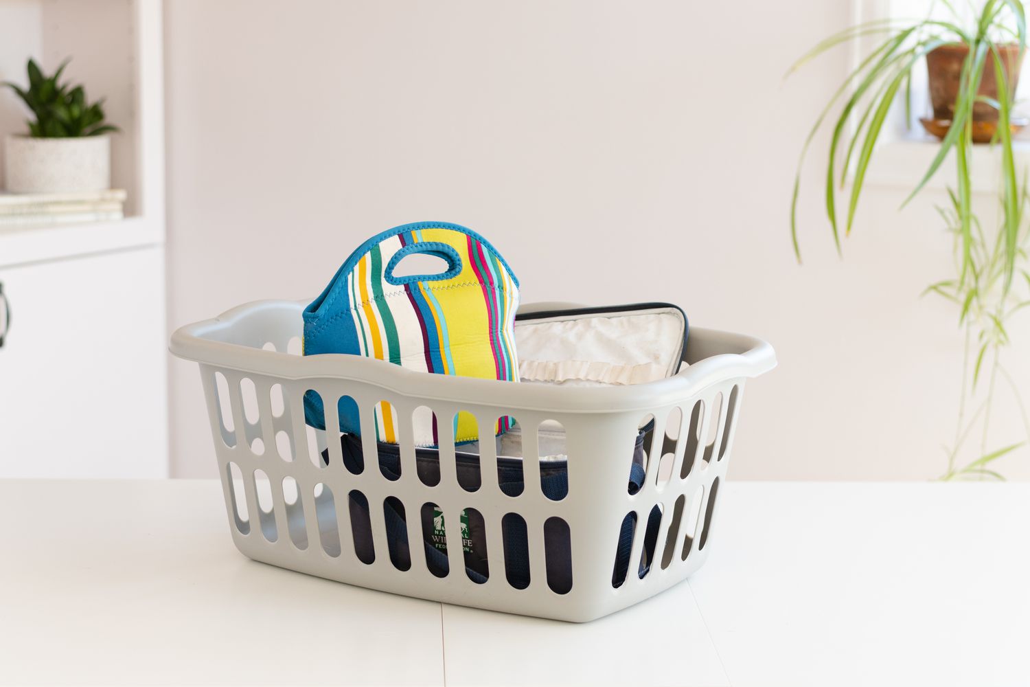 Lunch boxes inside laundry basket