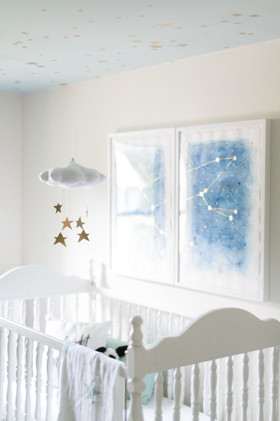 Sweet star-themed nursery with DIY constellation art