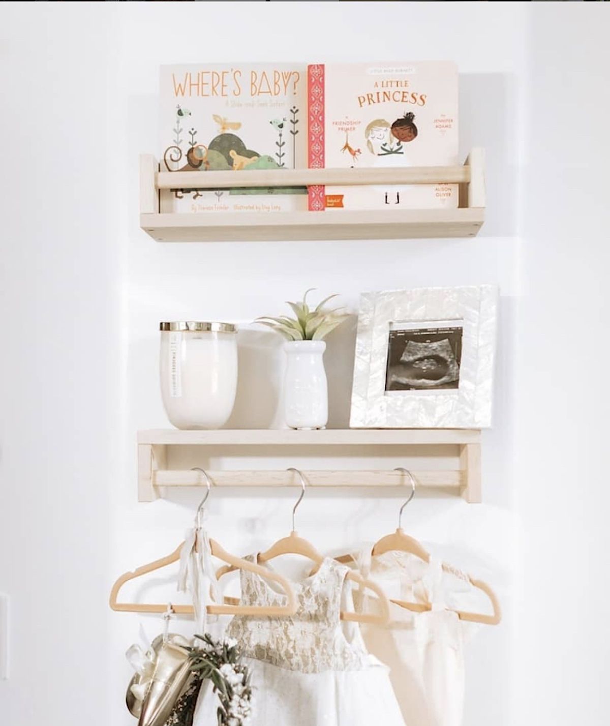 floating shelves, one with hanging rod for hangers