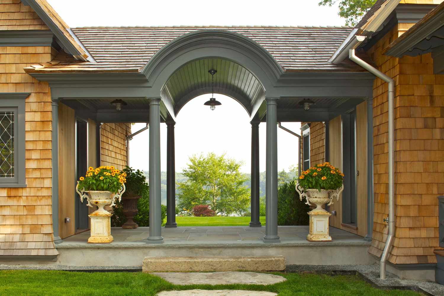 classic breezeway with flower pots