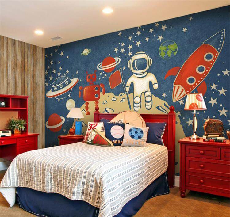 Chambre de garçon sur le thème de l'espace avec une peinture murale vintage de l'espace