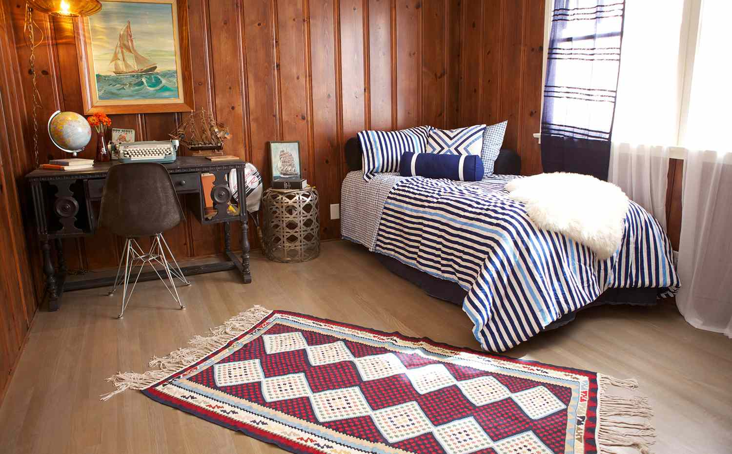 small guest room in bungalow wood paneling