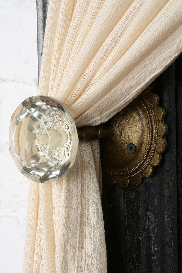 Vintage doorknobs repurposed as curtain tiebacks