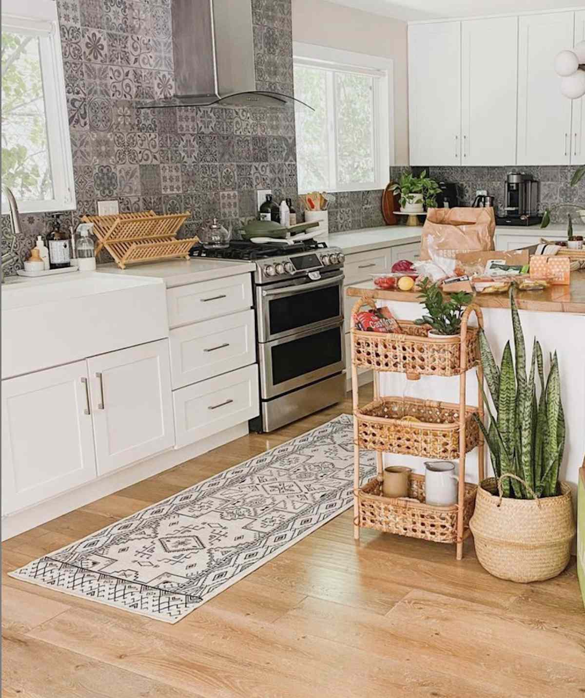 set of wicker baskets holding various kitchen items including cookbooks