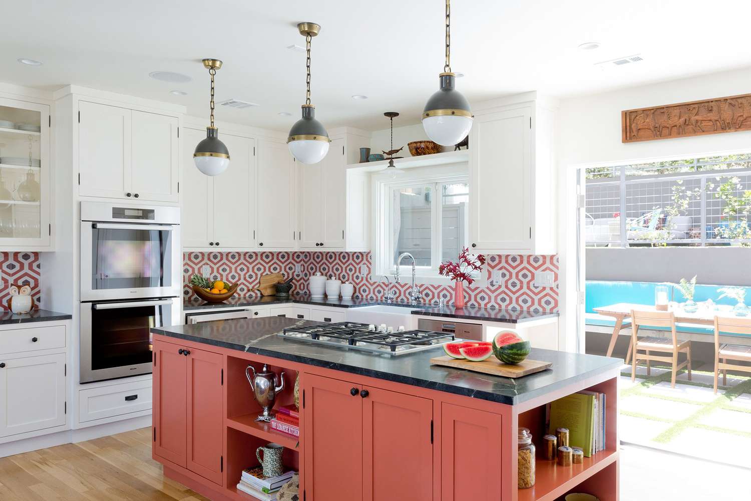colorful kitchen with orange island