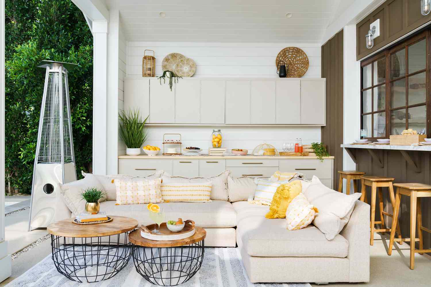 Jasmine Roth's patio space accessorized with yellow pops of color