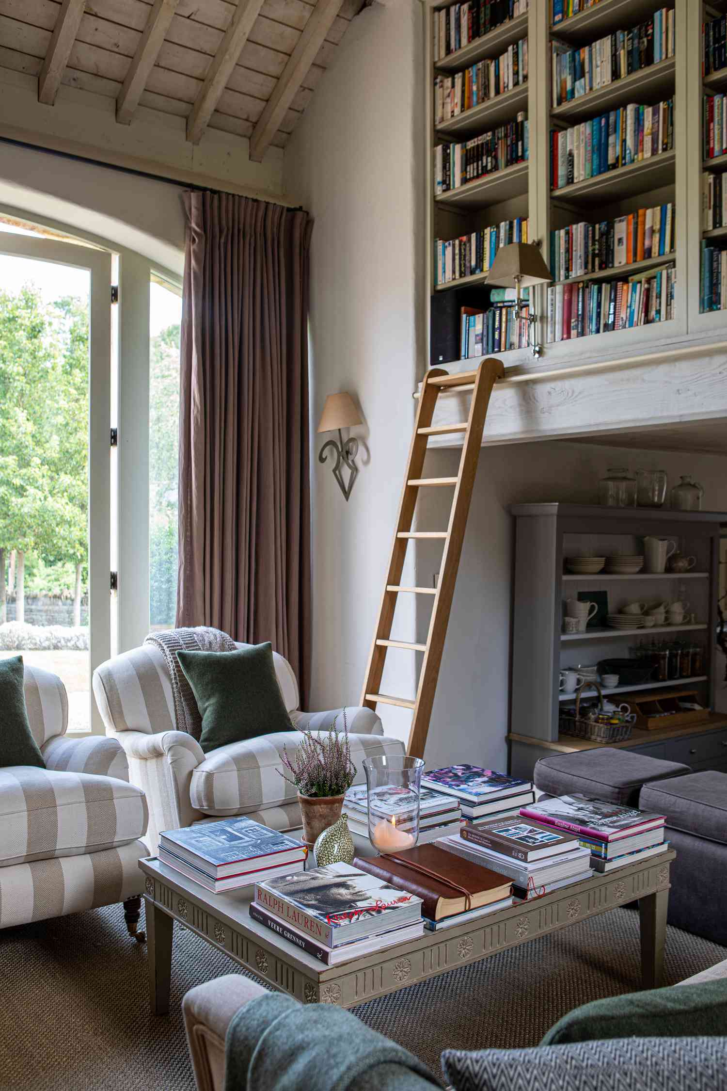 Faked built-ins in elevated library by Sims-Hilditch designers