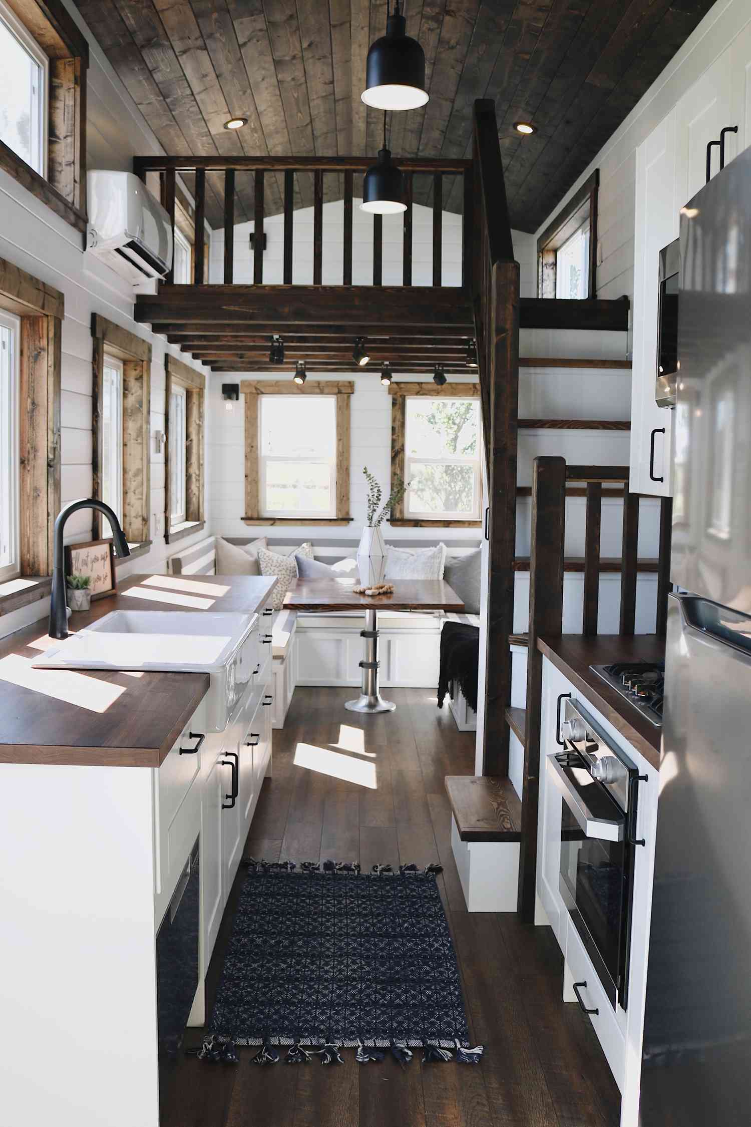 tiny house kitchen with dark wood accents