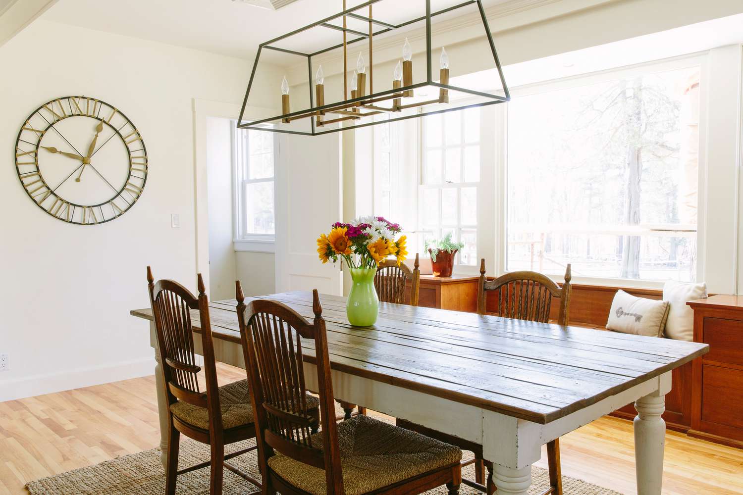 modern farmhouse dining room with geometric chandelier