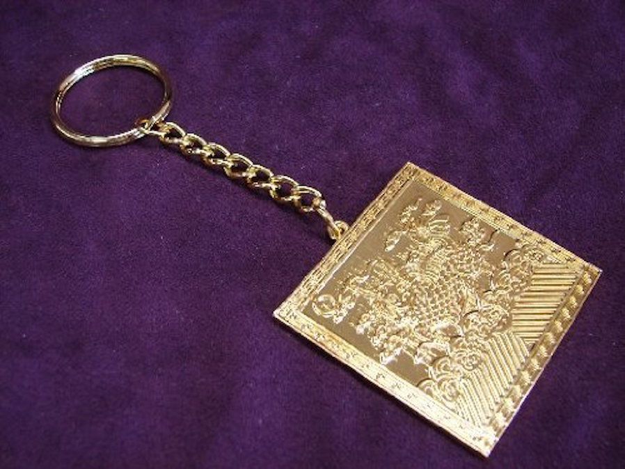 Metal Chi Lin keychain amulet