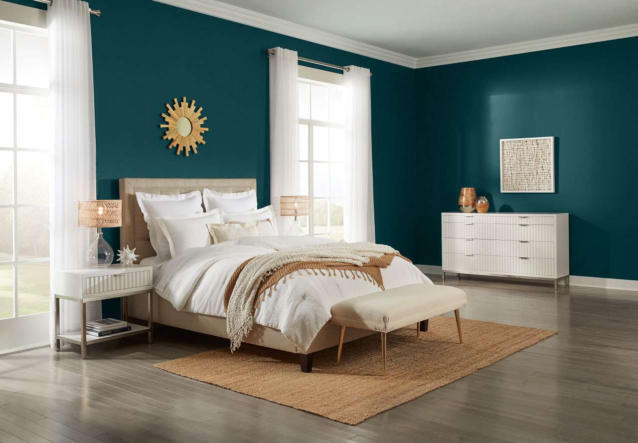 Color trend predictions 2022 - Ocean Abyss paint in bedroom