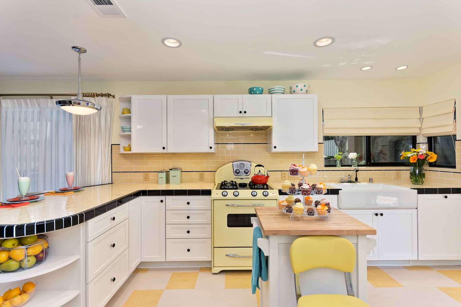 yellow and white tile retro kitchen