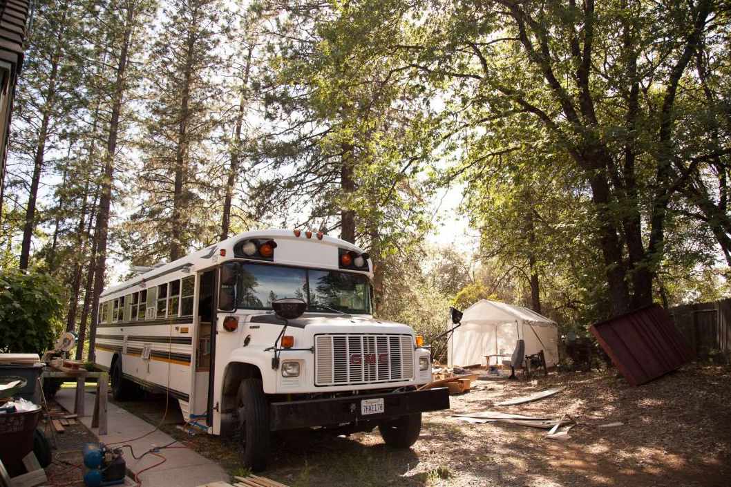 White bus at camp site