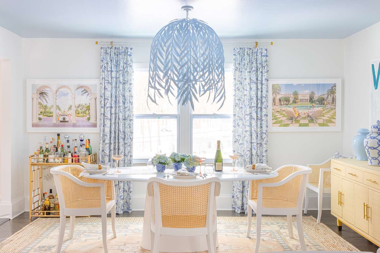 tropical colorful dining room with cane chairs