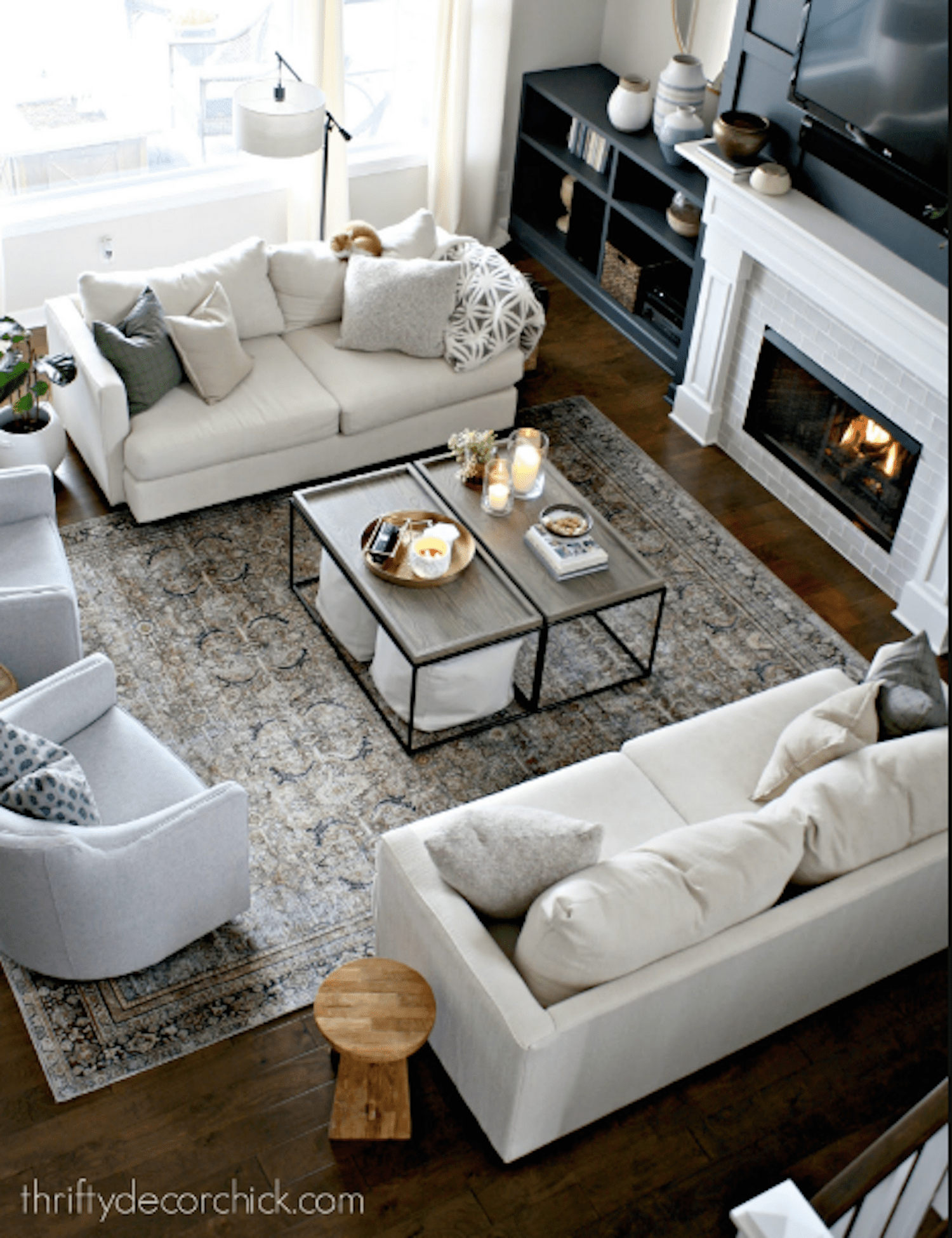 cozy great room with white sofas