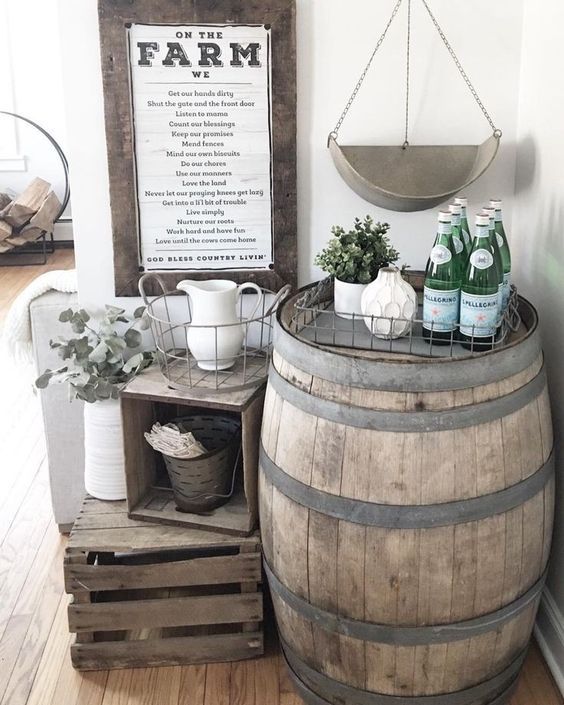 farmhouse setting with crates and a barrel