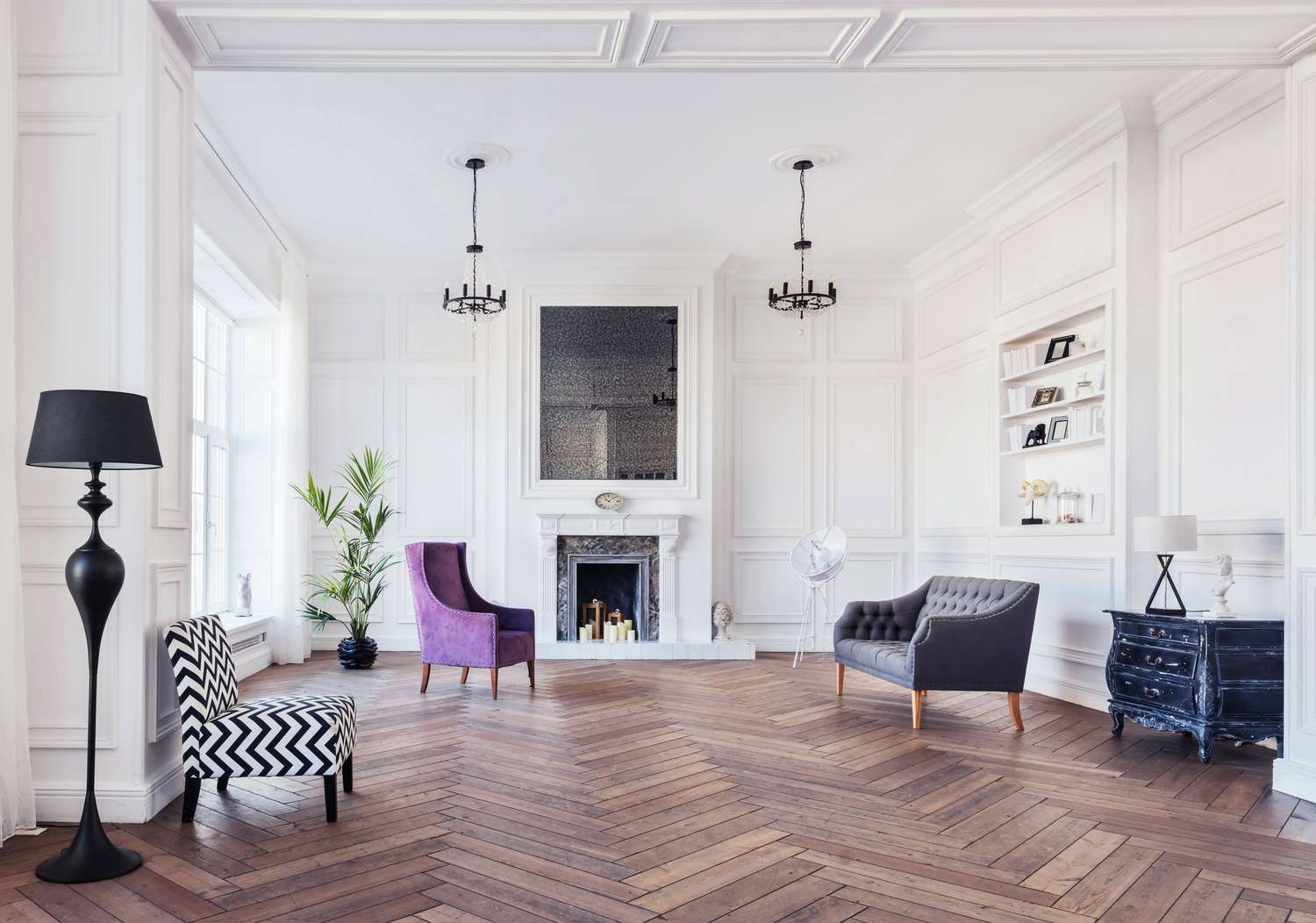 living room with high ceilings, fireplace, and herringbone wood floors