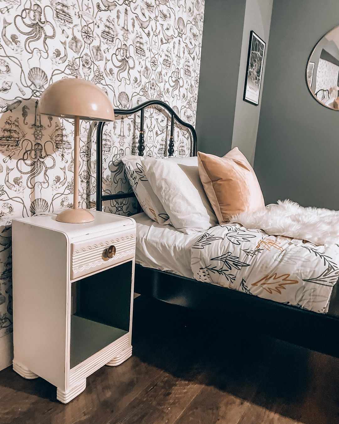 black and white wallpaper in guest room