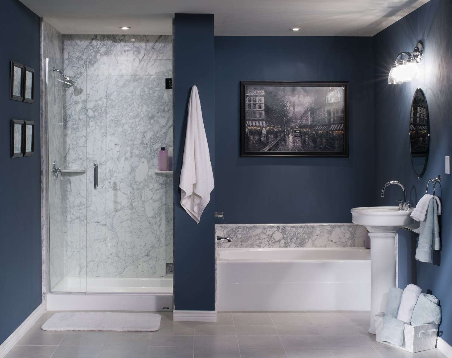 pedestal sink in navy blue bathroom