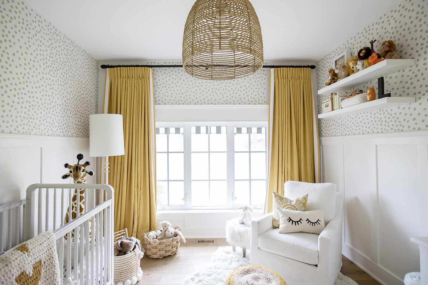 Neutral nursery with bold, mustard yellow accents.