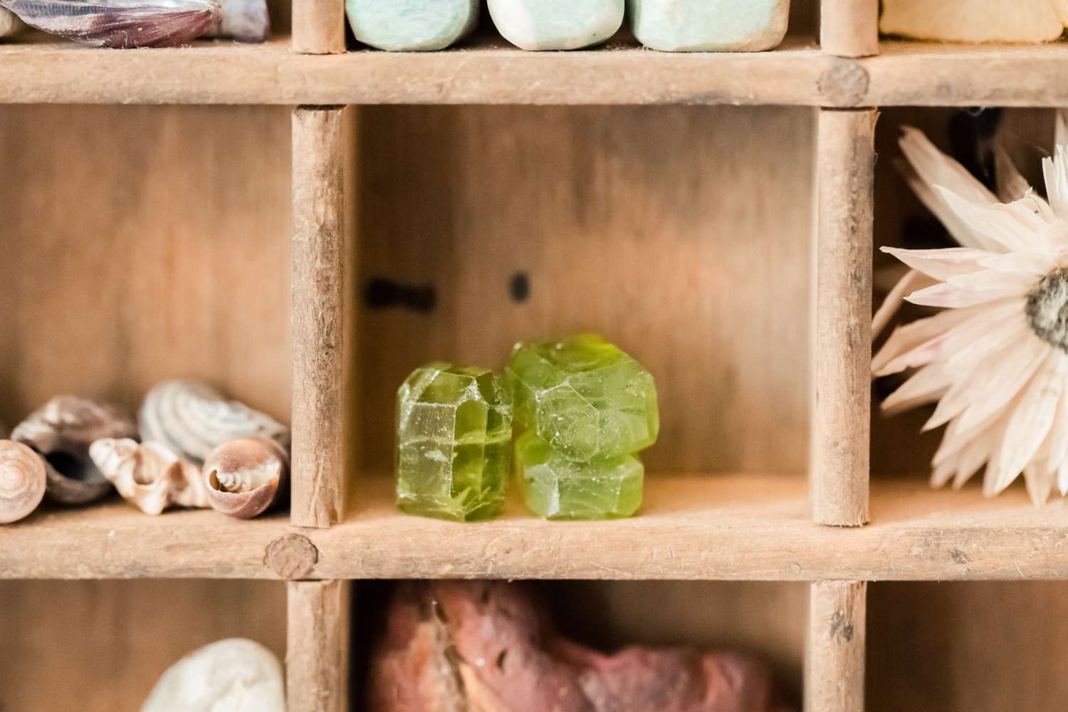 peridot crystals on a shelf