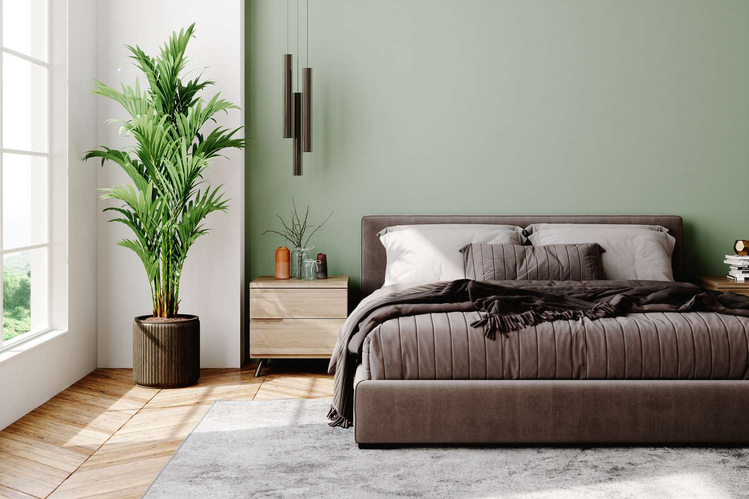 Um quarto com parede de destaque verde-sálvia