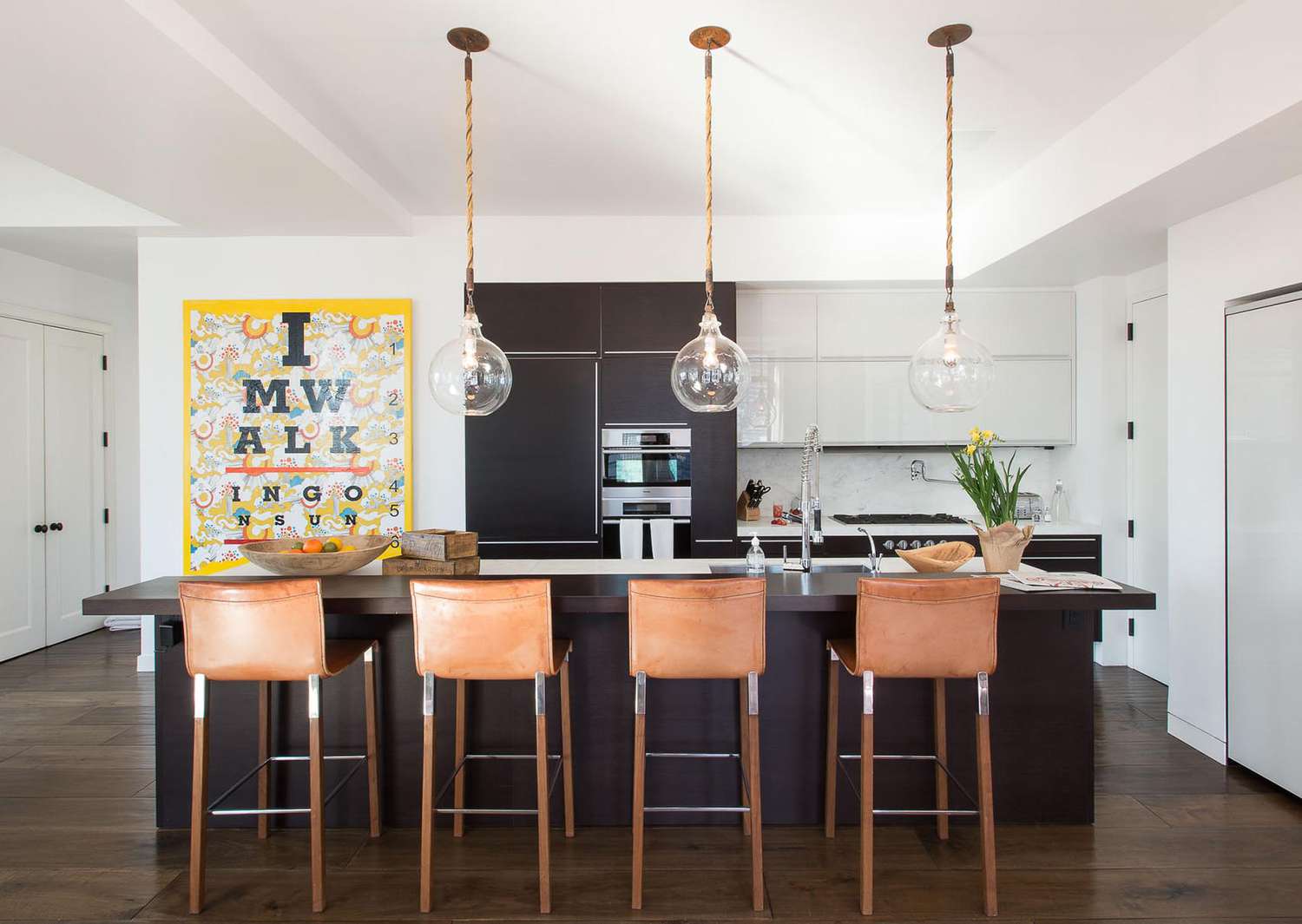 black kitchen with brown accents