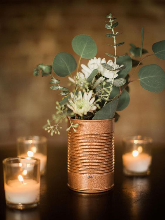 can centerpiece with white flowers