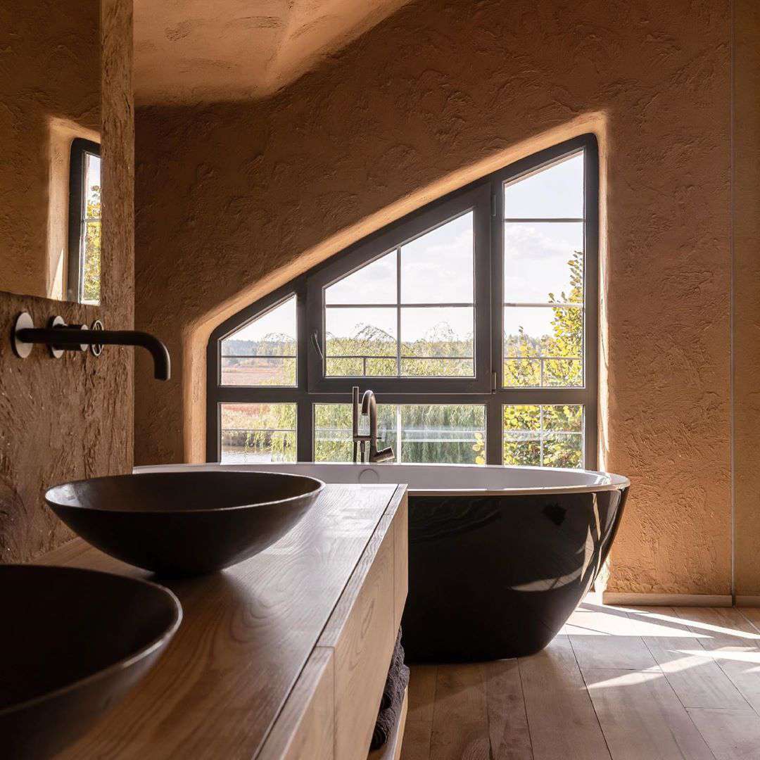 Soaking tub with a window behind