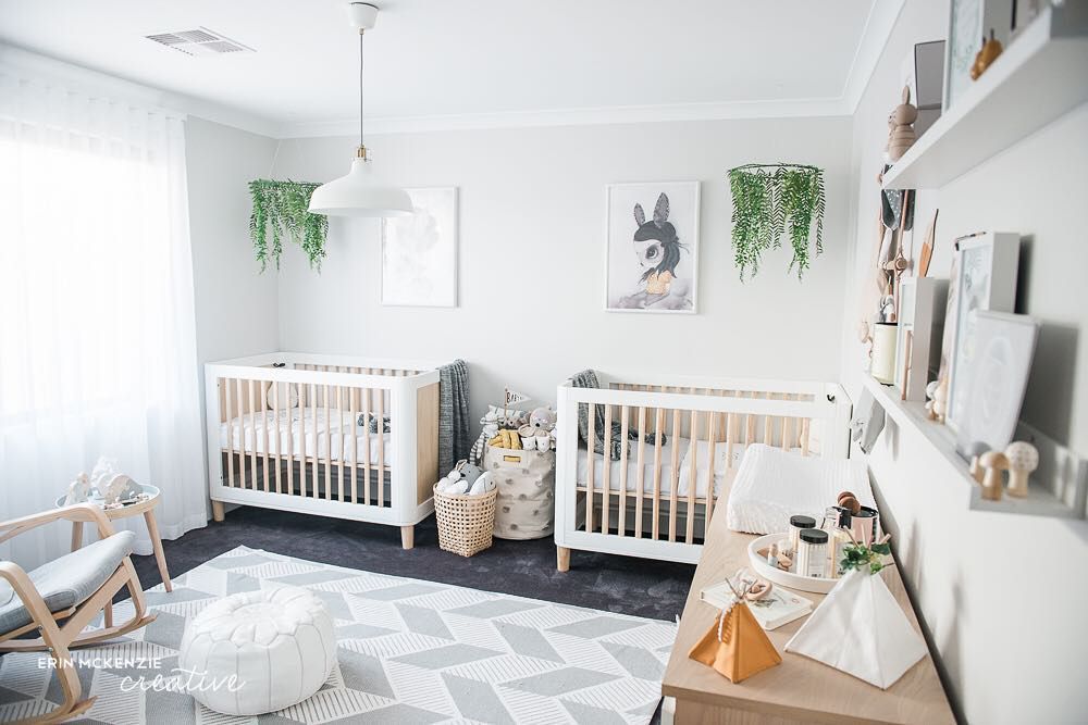 Boho chic twin nursery with nature theme