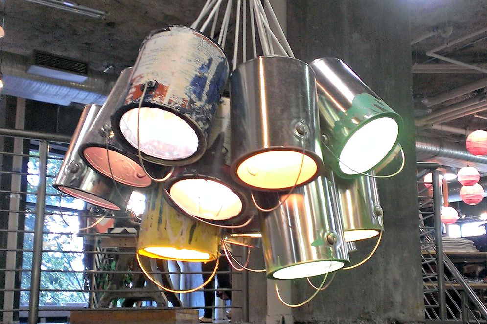 Old paint cans upcycled as a chandelier.