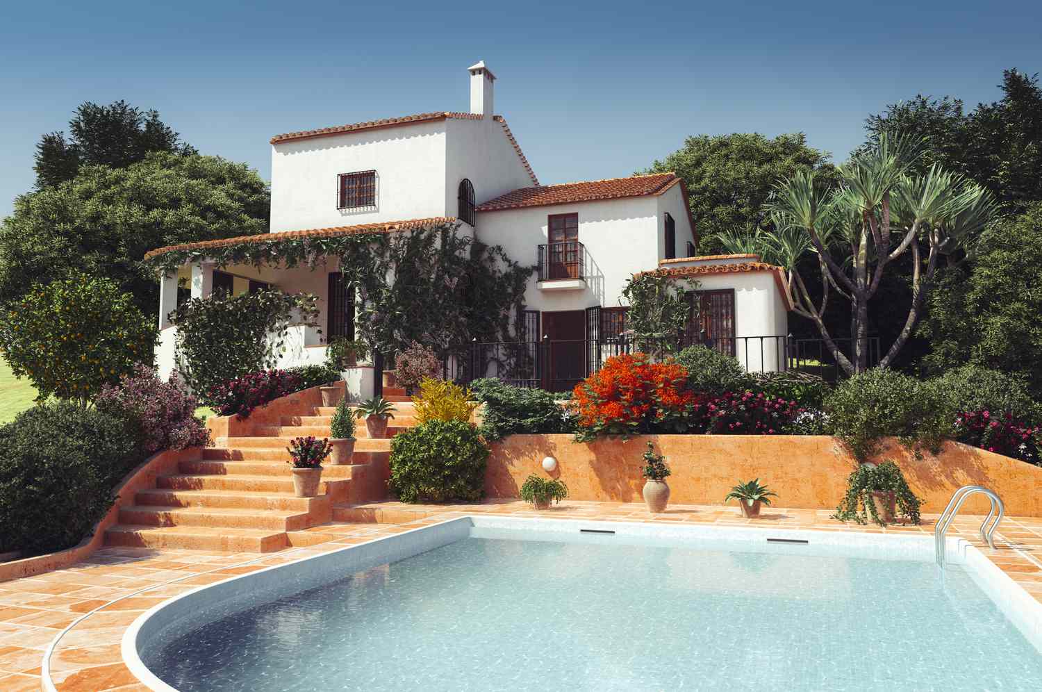 Une villa de style méditerranéen avec une piscine.