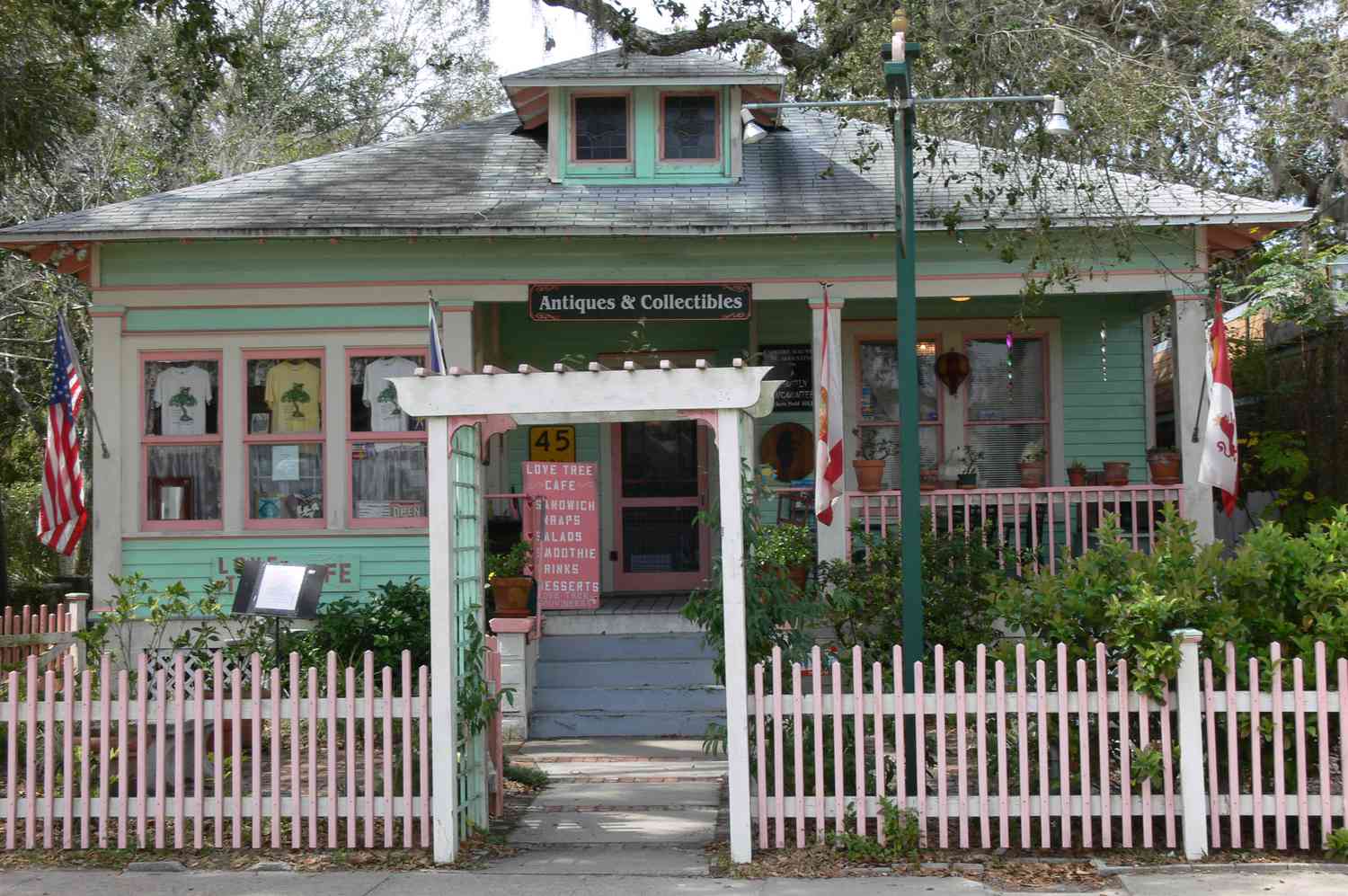 Green and pink attracts shoppers to a St. Augustine antique shop