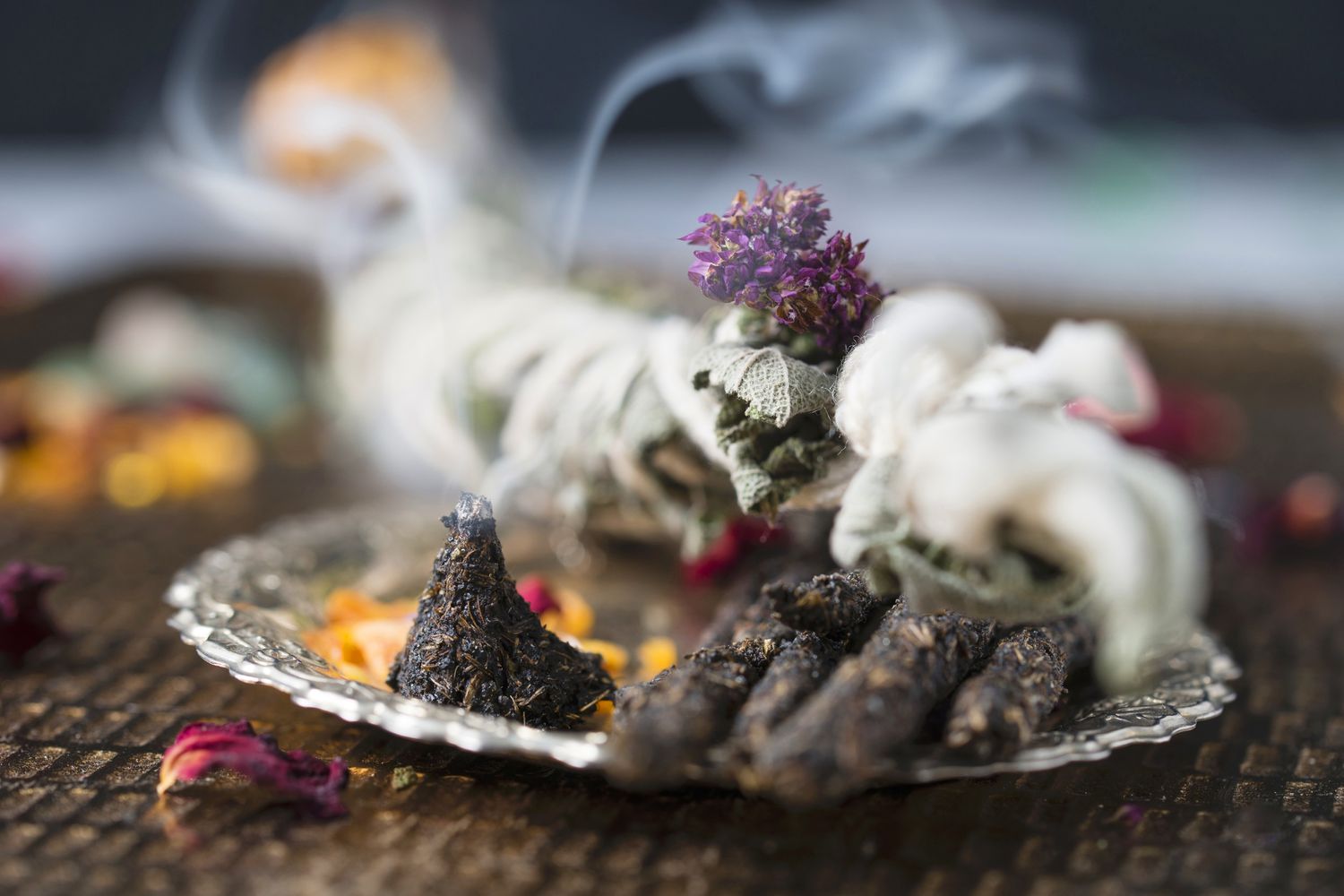 Smudging with herbs and sage for space clearing