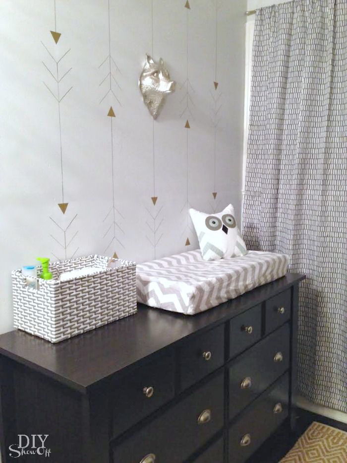 Metallic Gold Arrow Sharpie Accent Wall in baby nursery