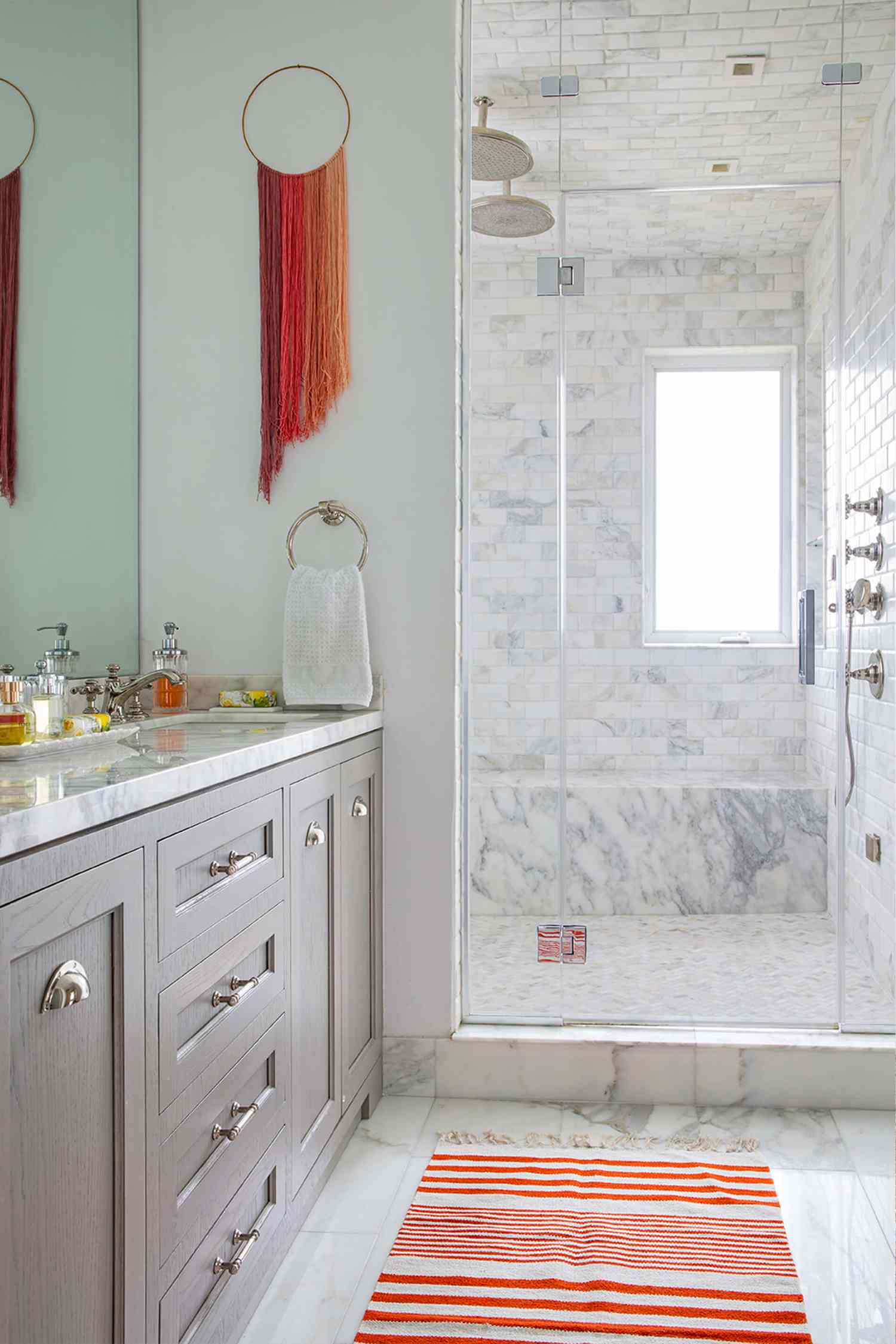 marble subway tile shower in bathroom