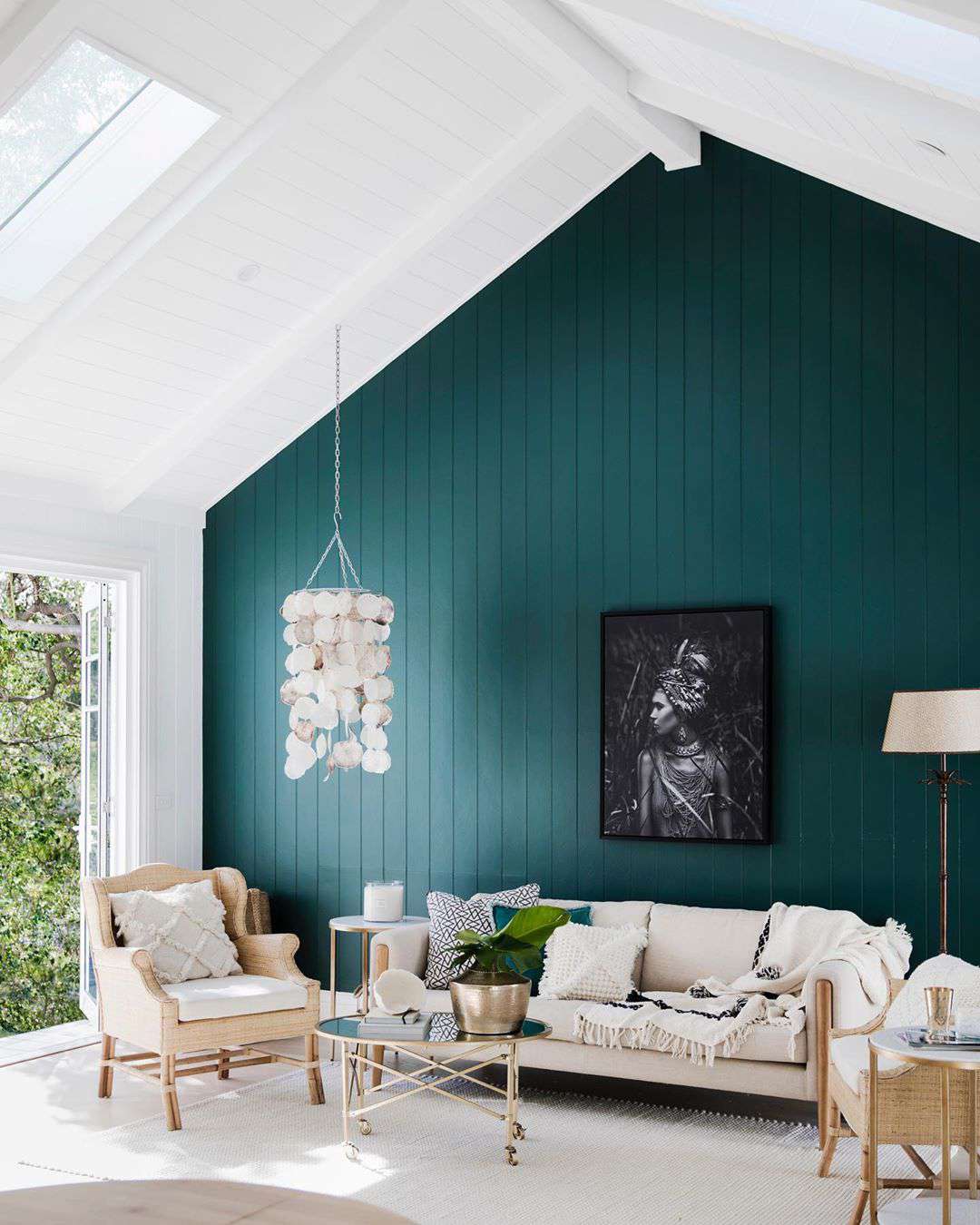 Hunter green accent wall in living room