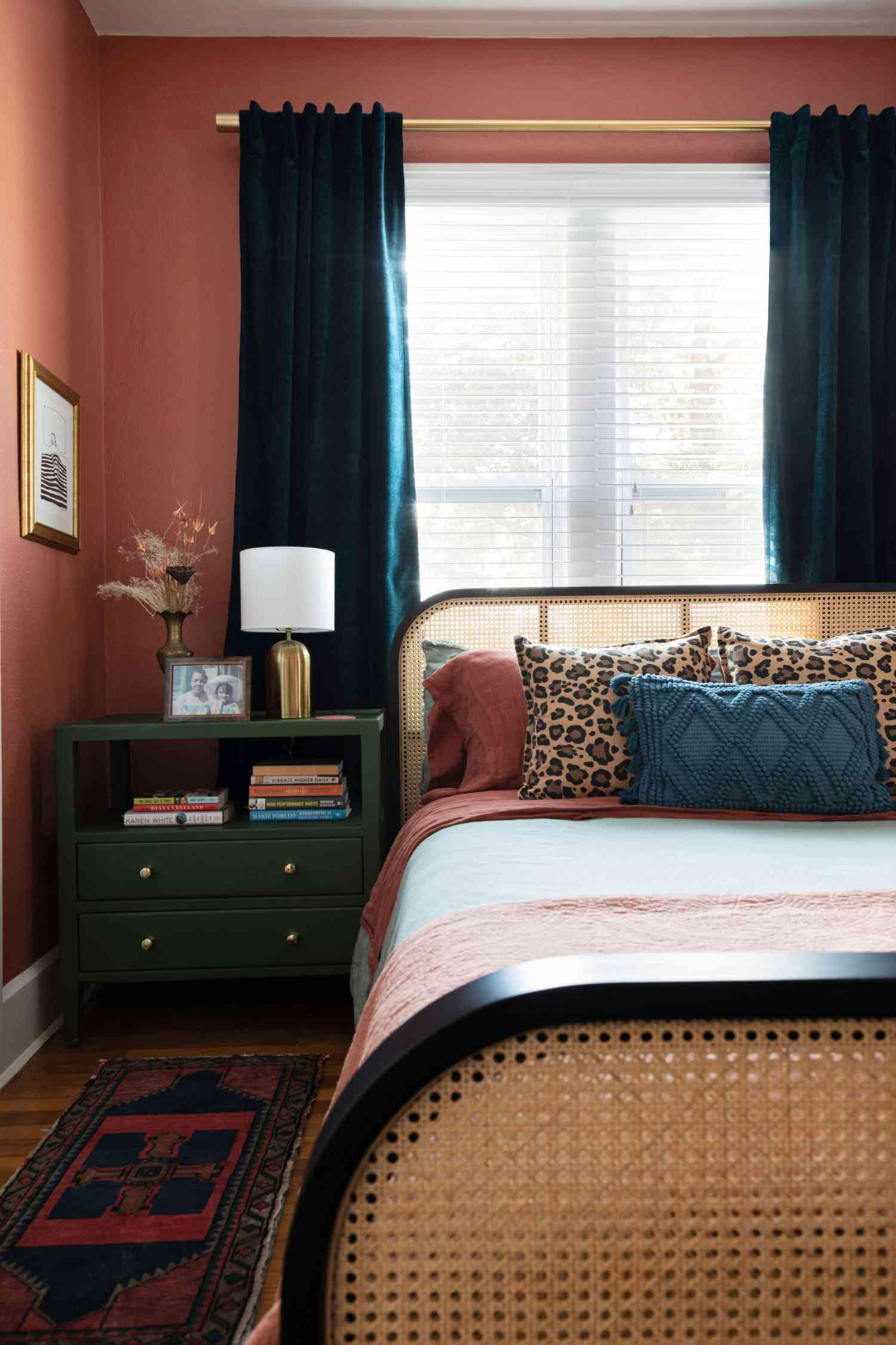 Florida house by Lisa Gilmore bedroom with animal print pillows