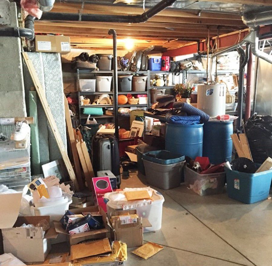Cluttered Basement Before Remodeling