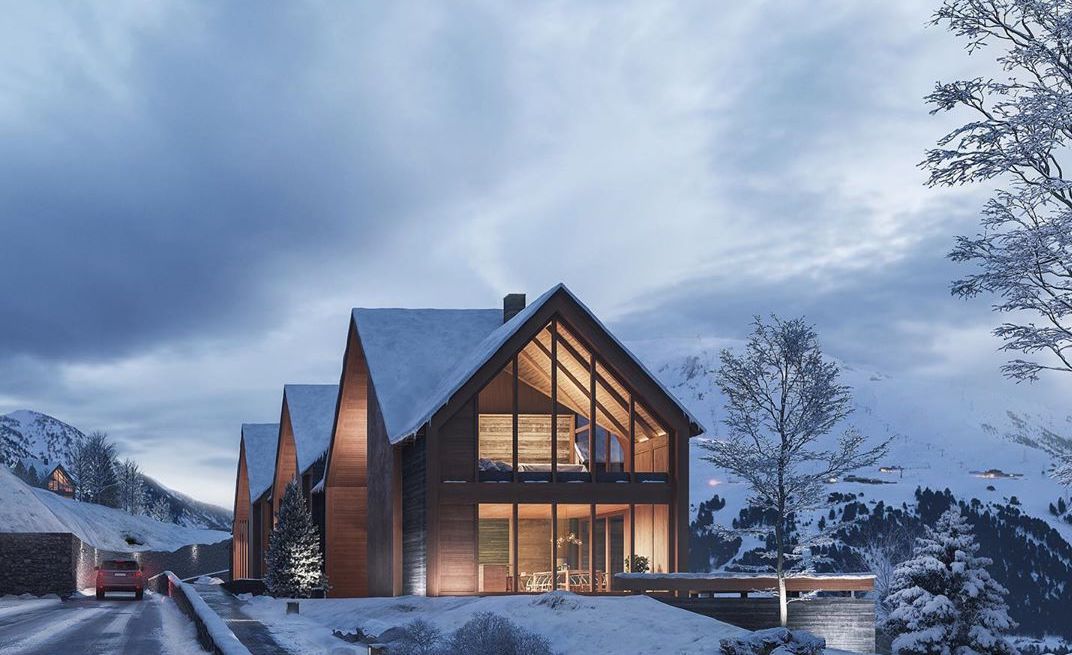 Casa moderna cercada por árvores nevadas