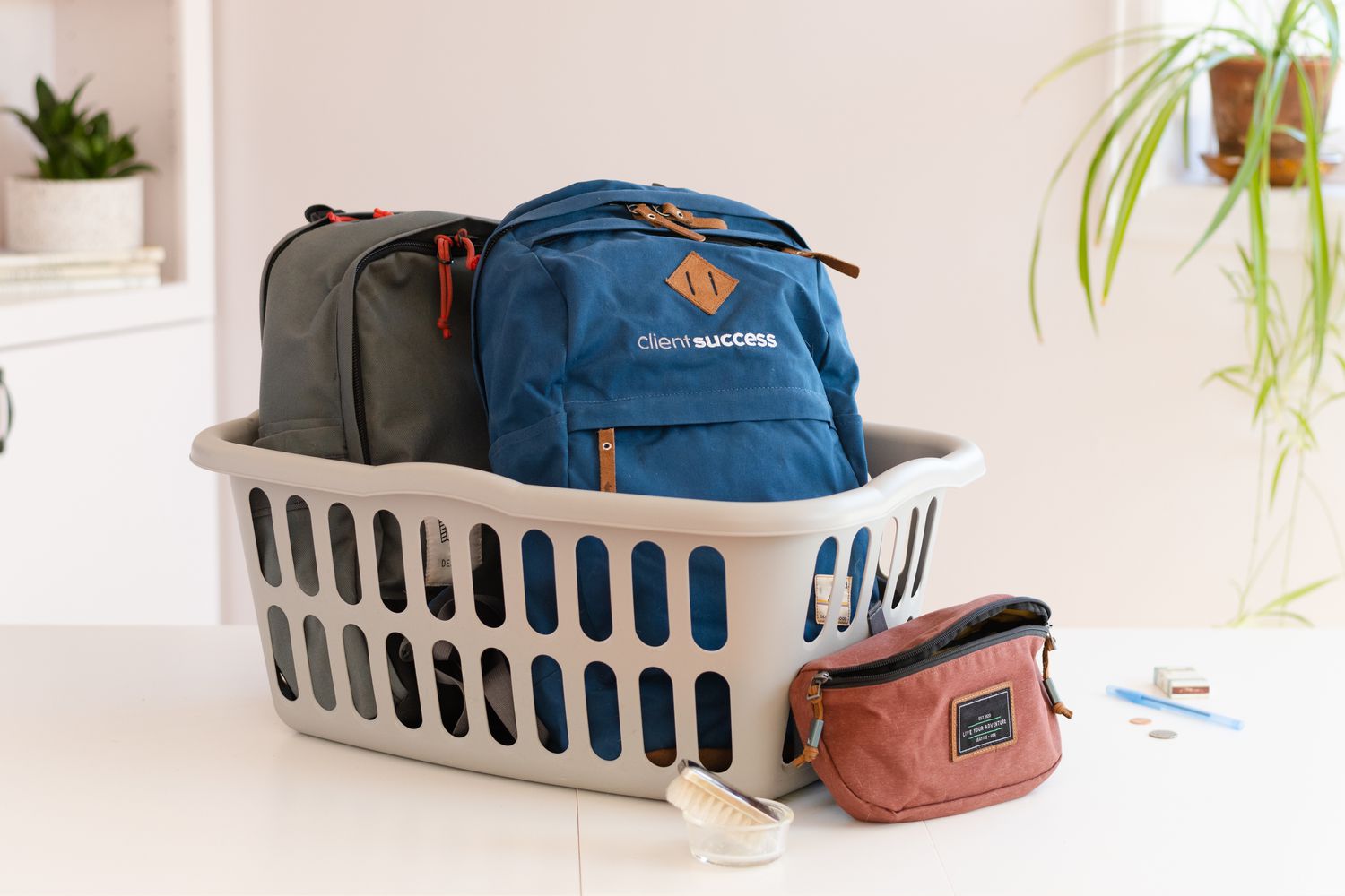 Backpacks inside laundry basket