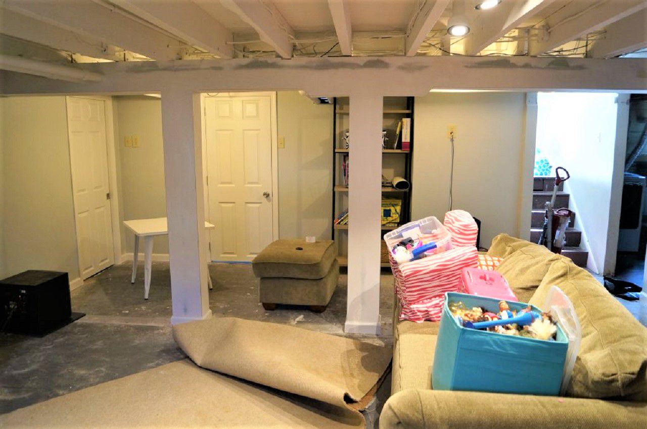 Cluttered Basement Space Before Remodeling