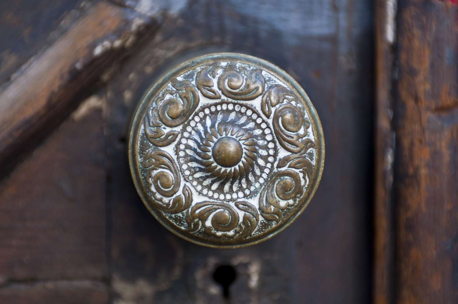 close-up view of antique brass door knob