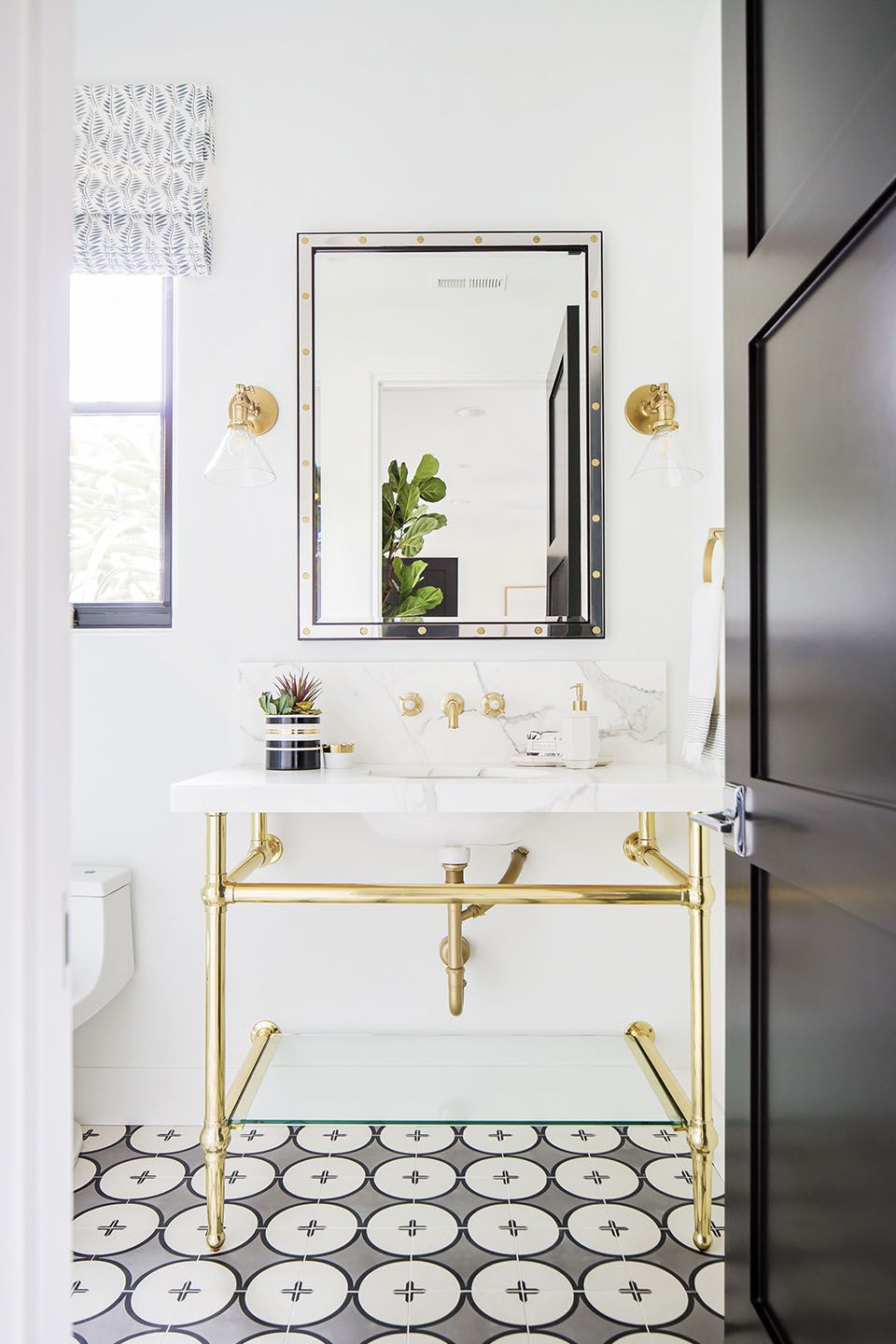 Glam gold and marble pedestal sink