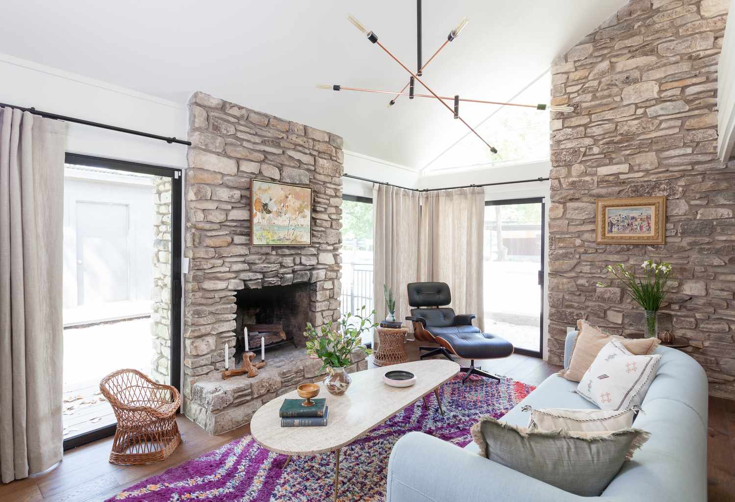 Mid-century modern living room by Erin William Design.
