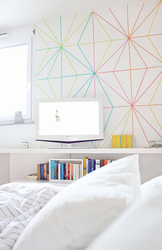 Geometric accent wall using colored Sharpies on white wall