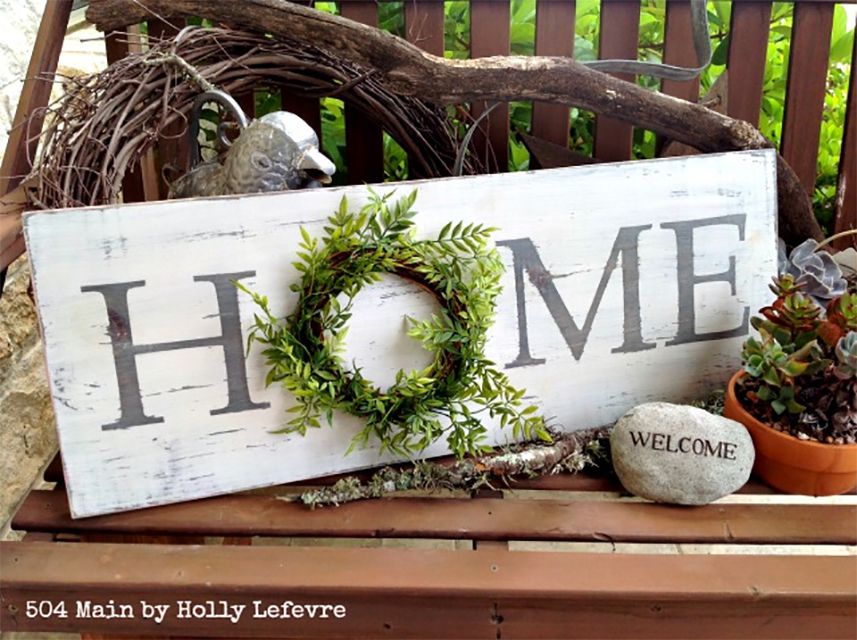 A White and black Home sign