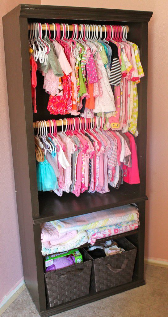 Bookshelf repurposed as a DIY nursery closet