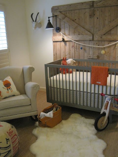 Rustic barn door headboard in nursery